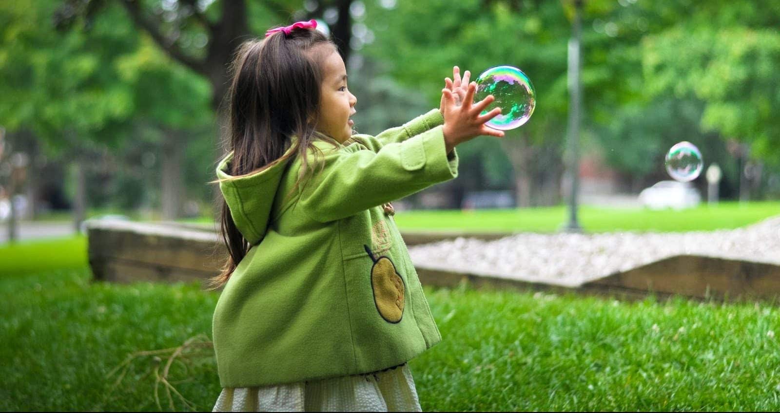 Toddler Playing with Bubbles for Sensory Play